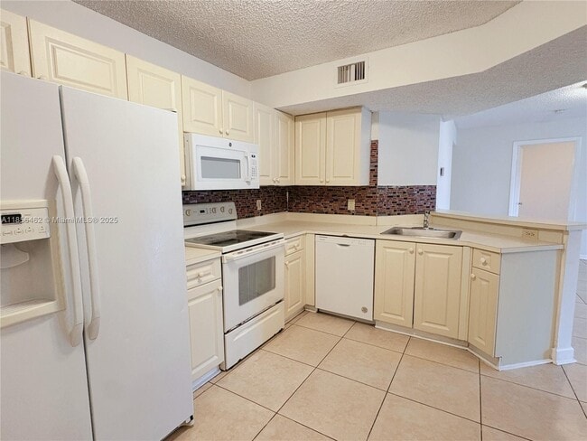 Photo - 9055 Wiles Rd Unit 204