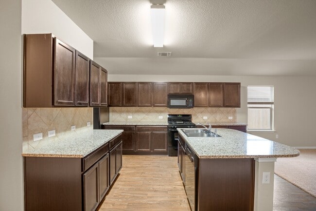 Photo - Comfortable 3BR / 2BA Home with Island Kitchen & Private Backyard