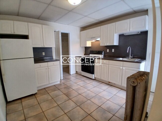 Building Photo - 437 Cambridge St Unit 55