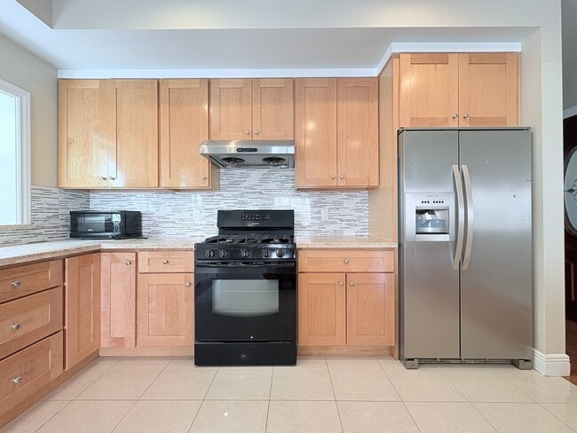 Large kitchen with generous sized island and plenty of cabinets - 109 Hillcrest Dr