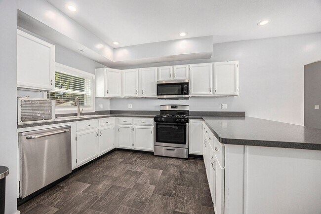 Photo - Spacious 5BR/2.5BA in Creston with Garage & Fenced Backyard