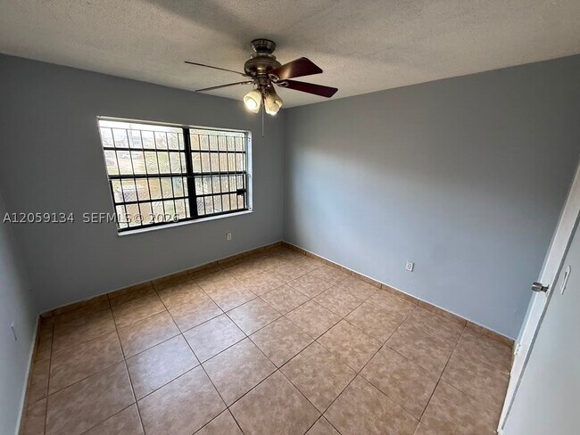 Photo - 1325 W 68th St Unit 111