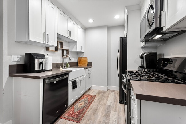 Photo - 6600 Warner Ave Unit 119