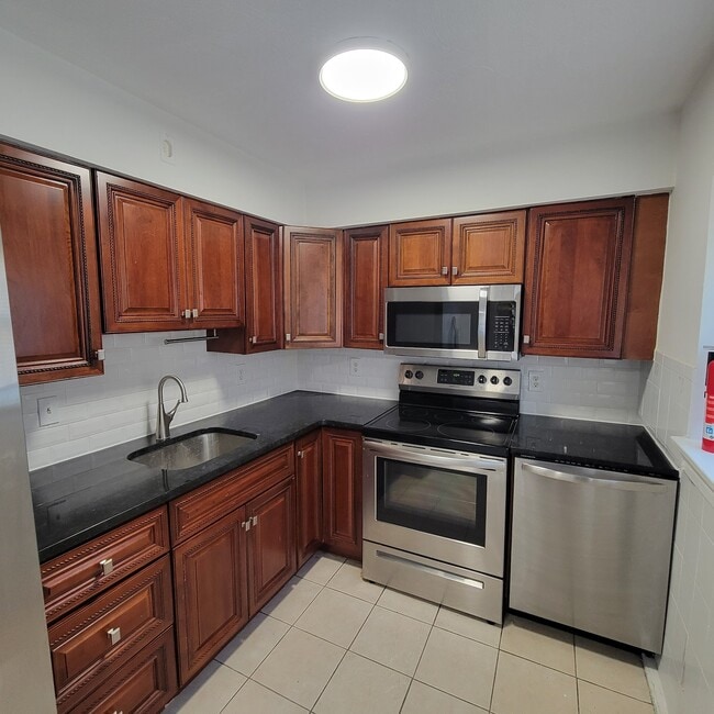 Building Photo - 6405 Durham Ave Unit 1G