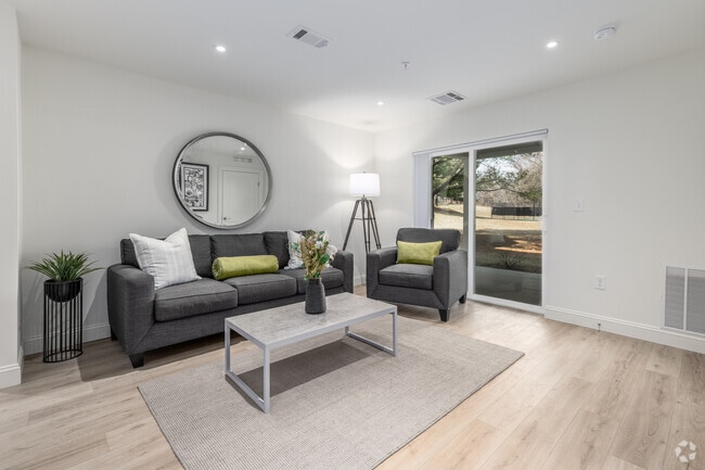 2BR, 2BA - 1,409SF - Living Room - Bowling Brook Apartments