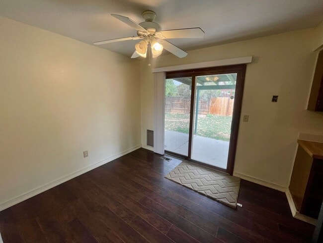 Photo - 4 Bed, 2 Bath Loveland, CO Home- Fenced Backyard, A/C, & 2 Car Garage!