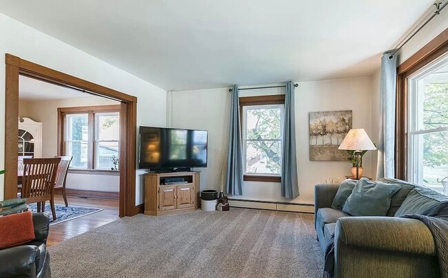 Photo - Spacious 4-Bedroom Home with Sunroom, Garage & Private Driveway!