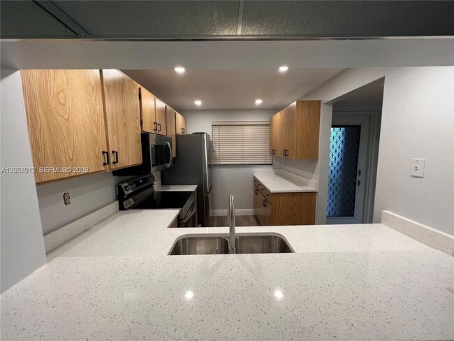 Building Photo - 9520 Seagrape Dr Unit 403