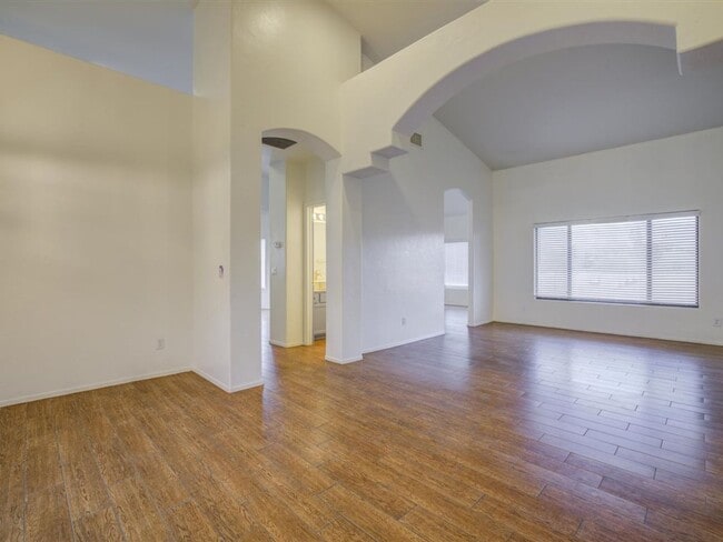 Photo - Spacious 4-Bedroom Home with Open Layout & Large Backyard