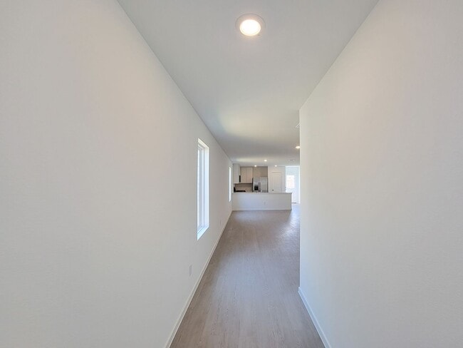 Photo - This single-story home shares an open layout between the kitchen, nook and family room for easy e...