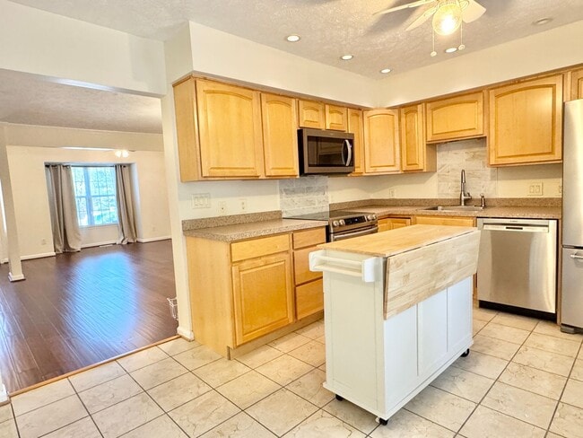 Photo - Bright Townhouse with Finished Basement, F...