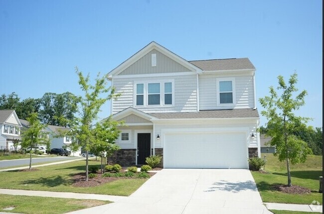 Building Photo - Spacious 4-Bedroom Home with Modern Comforts