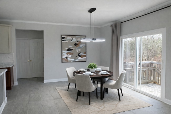 Spacious dining table room with large pack patio entrance - 429 Indigo Ridge Dr