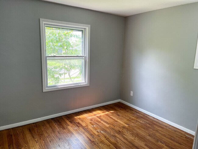 Photo - Move-In Ready 2BR Home w/ Refinished Hardwood Floors + Bonus Room Basement!