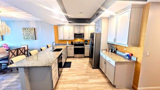 Photo - Annual Turnkey 3/3 penthouse on waterfront...