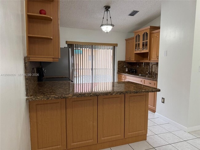 Photo - 7792 W 29th Way Unidad 202