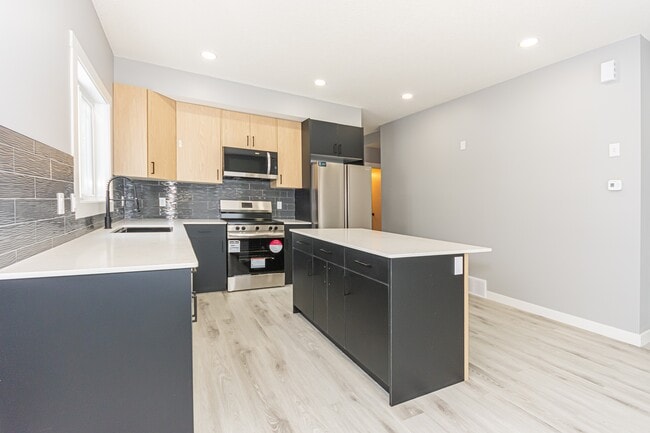 Photo - 11547 St Albert Trail NW Unit Upper-11549
