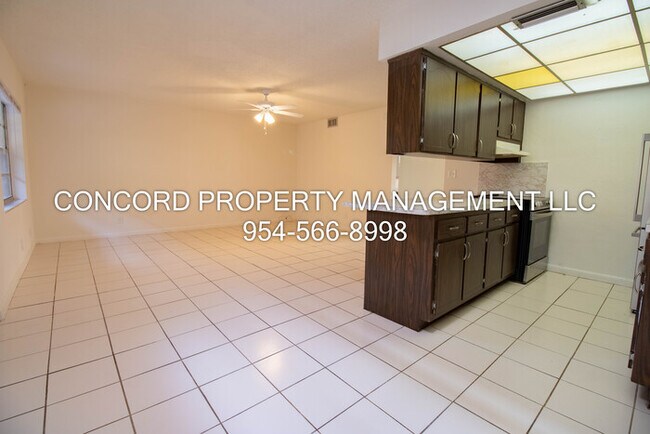 Photo - Spacious 2 Bedroom, 1 Bathroom- Pool - Laundry on Site- Fully Tiled- Central AC Unit 3