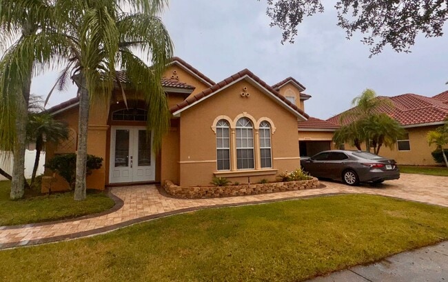 Building Photo - 5 Bedroom 4 Bath East Orlando home in Fountains at Rio Pinar!