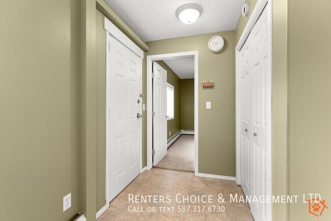 Photo - Main Floor 2 bedroom Unit With Onsite laundry, BONUS INCENTIVE