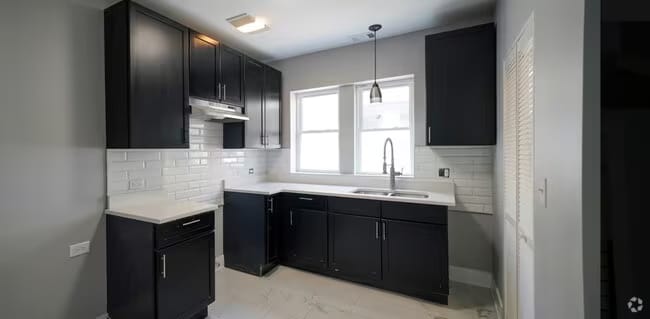 Building Photo - 7305 S Yates Blvd Unit 3 Rental