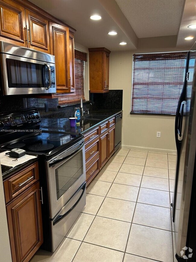 Building Photo - 2277 SE 27th Dr Unit 101-G Rental