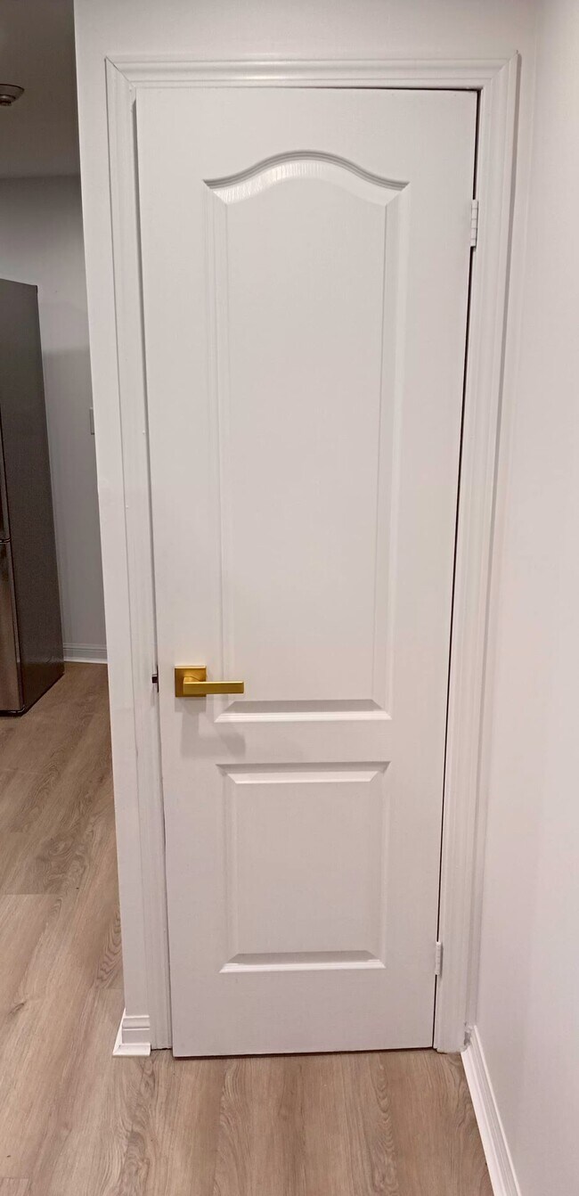 closet door - 108 Neptune Dr Unit Basement Suite