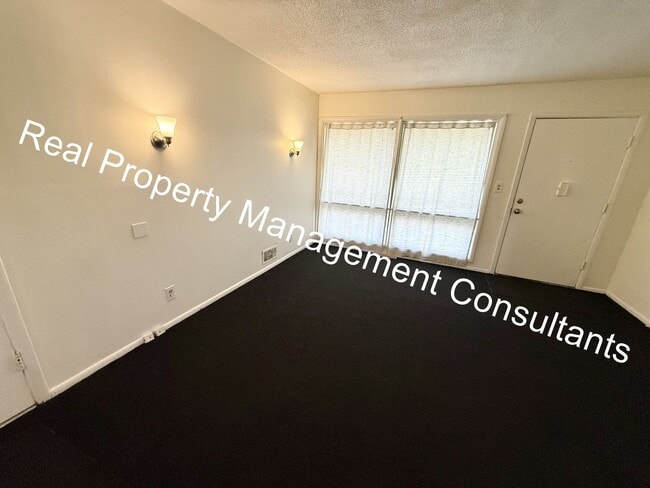 Photo - Charming 3-Bed Home with Fenced Yard & Garage