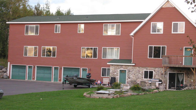 Garages for units 1,2 & 3 & front entry to unit #4 - 5185 Samuelson Rd Townhome