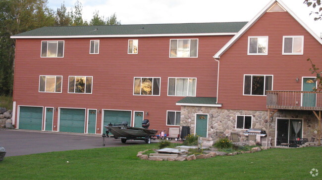 Garages for units 1,2 & 3  & front entry to unit #4 - 5185 Samuelson Rd Rental