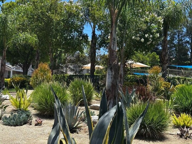 Building Photo - Nestled in a Quiet Peaceful Valencia Community is ...