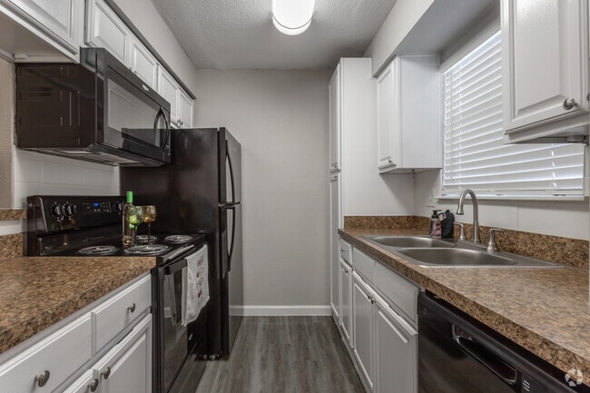 White & Brown Kitchen - Windfern Meadows Rental