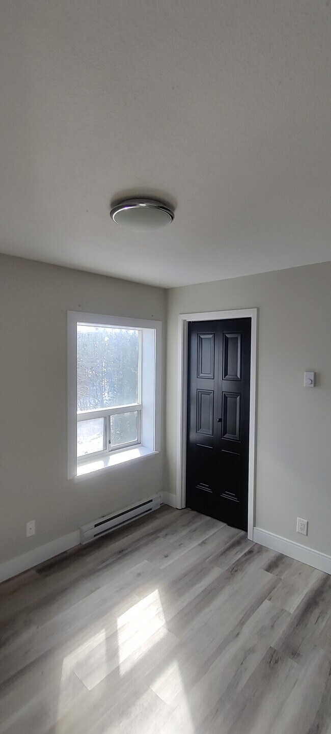 Photo - Spacious 3BR Apartment with Modern Finishes & Bright Open Layout Unit 102A