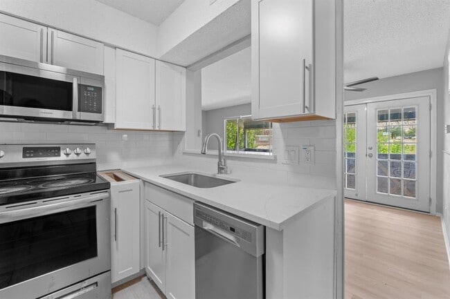 Building Photo - 8903 Parkfield Dr Unit 203