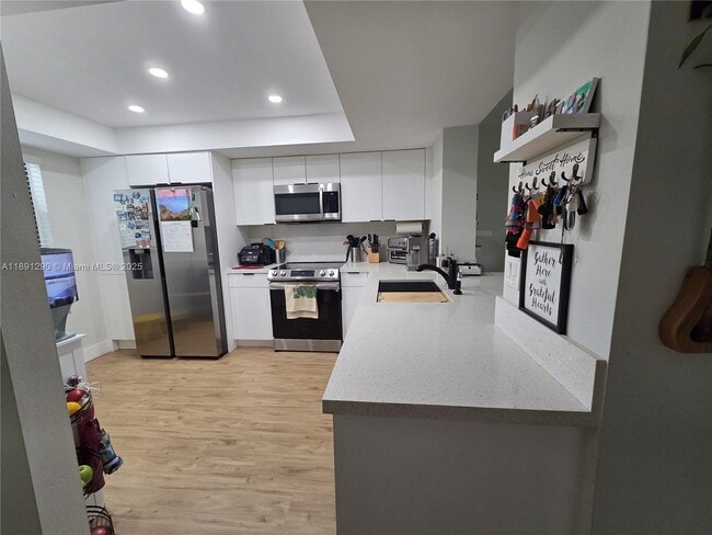 Building Photo - 16171 Blatt Blvd Unit 310