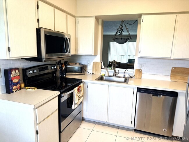 Building Photo - 7146 Huntington Ln Unit 403