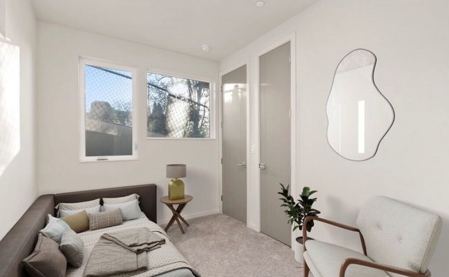 Habitación compacta con buena luz natural y una distribución limpia y funcional. - 2921A Franklin Ave E Unidad The Eastlake Perch