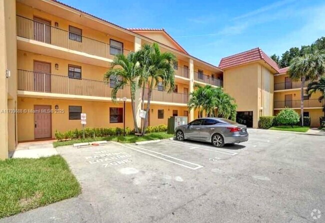 Building Photo - 11453 NW 39th Ct Unit 310-2 Rental