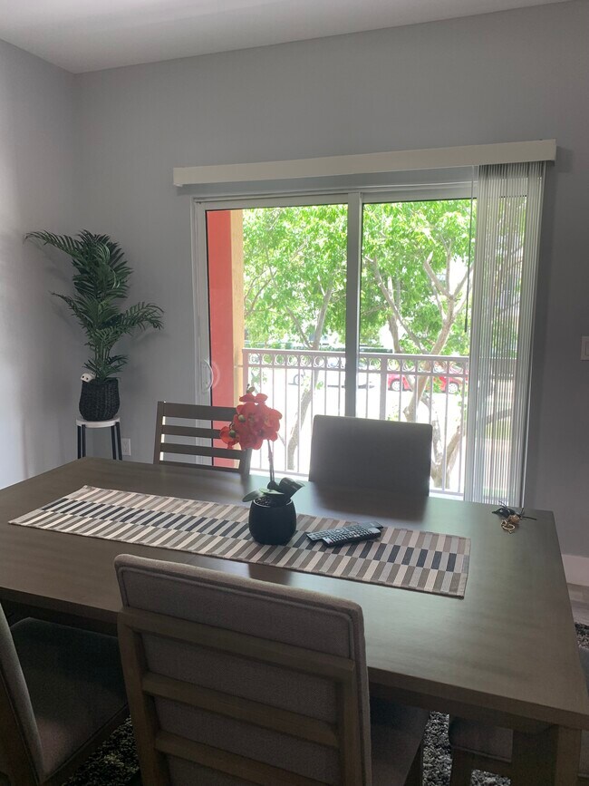 Building Photo - 10902 NW 83rd St Unit 216