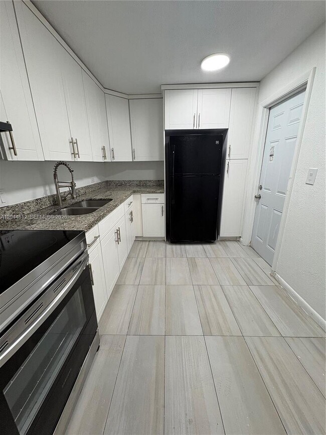 447 NE 195th St Unit 214