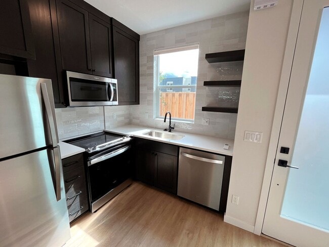 Photo - Stunning Townhome Unit with Laundry, A/C, Private Patio