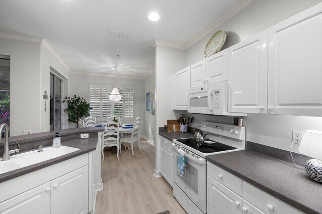 Tarpon Cove condo - close to the beach. Yacht club membership is available.