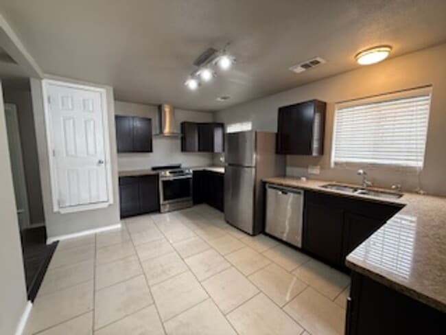 Photo - **50% Off First Month's Rent!!** Move-In Ready 4 Bedroom Home with Updated Kitchen & Private Yard