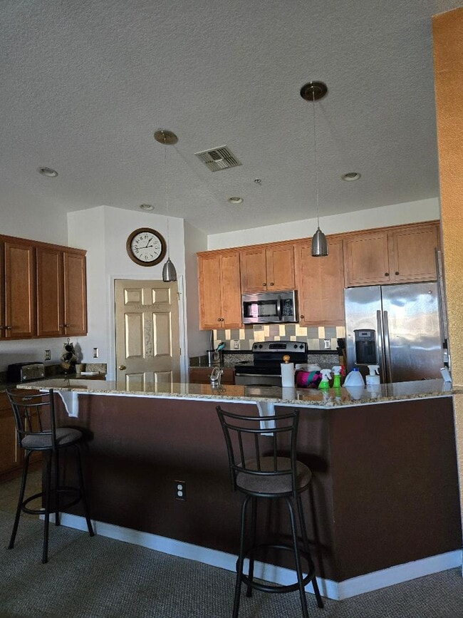 Building Photo - 5356 Mang Pl Unit 1104