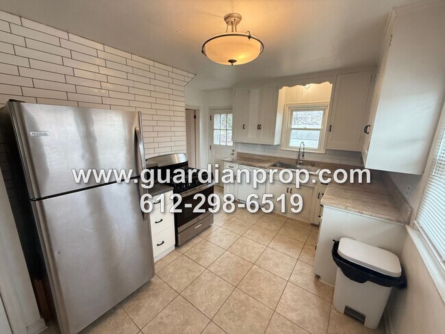 Photo - Highland Park House Available Now On Corner Lot, HW Floors, Updated Bath, Fenced Yard, 2 Car Garage