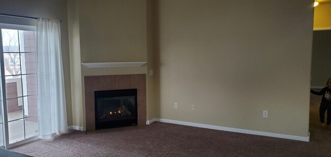 LR with gas FP. Sliders to covered deck with mountain view. - 2214 Owens Ave Unit 2214 Owens Ave #202