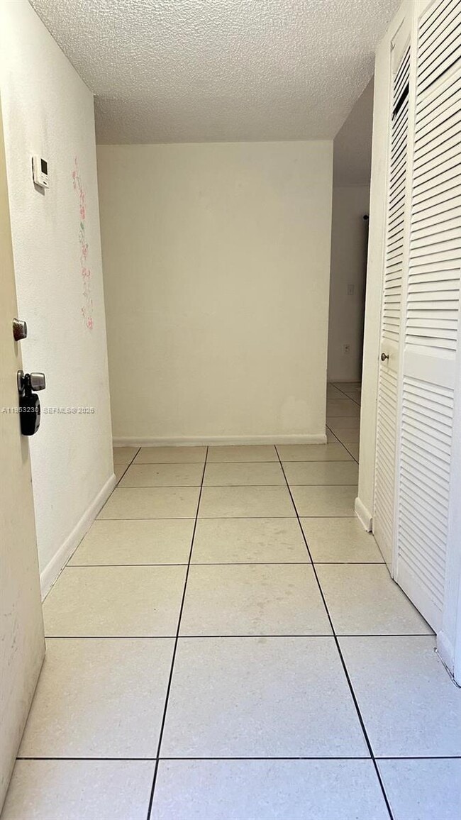 Building Photo - 17650 NW 68th Ave Unit A1005