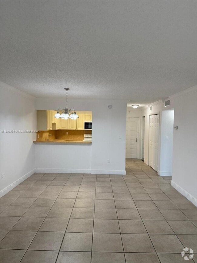 Building Photo - 6990 NW 186th St Unit 4-509 Rental