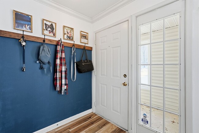 Photo - Enjoy the ease of condo style townhome living in this bright and inviting end unit.
