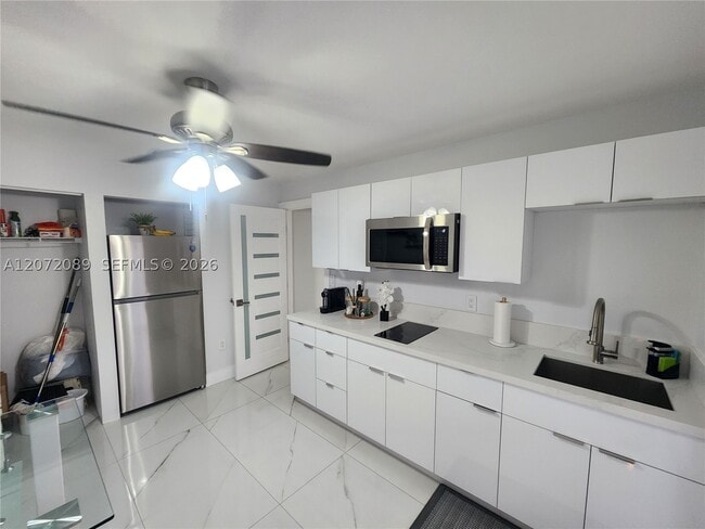 Building Photo - 98XX NW 122nd St Unit APT1